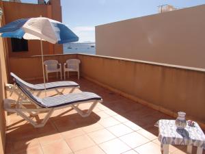 Furnished back terrace with partial sea views